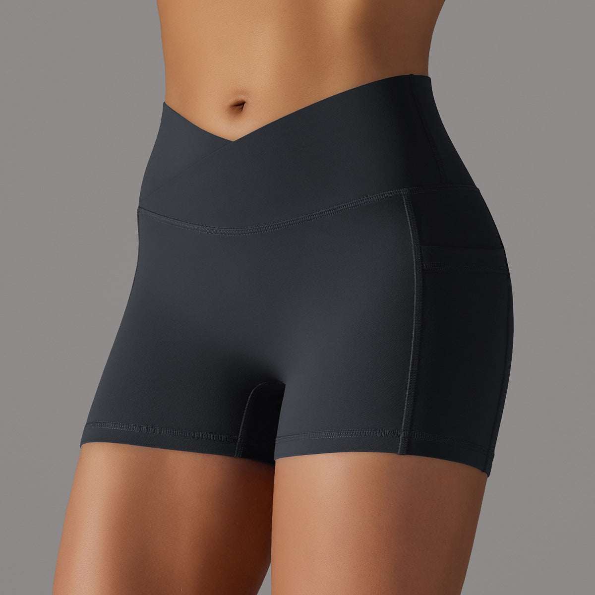 Women's high waist yoga shorts with phone pocket and moisture-wicking fabric for active workouts