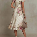 Printed V-neck Defined Waistline Ruffled Hem Dress